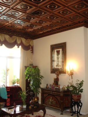 210 faux tin glue up ceiling tiles in antique copper installed in a entry room in a Boca Raton, Florida home.