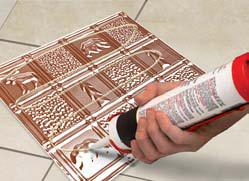 To the back of your metal backsplash, liquid nails can be applied.