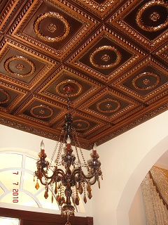 210 Antique Copper - Faux Tin Glue Up Ceiling Tiles installed on a 12 foot ceiling with a dark glass chandelier.