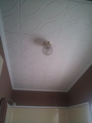R82 Styrofoam Ceiling Tiles Installed in Bathroom Our R82 Styrofoam Ceiling Tiles installed in a bathroom with brown walls.