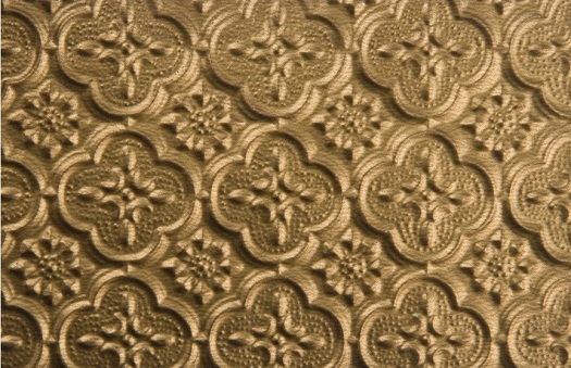 WC 20 faux tin backsplash roll in brass.  The image is taken of a piece that is 6 inches wide and 4 inches high.