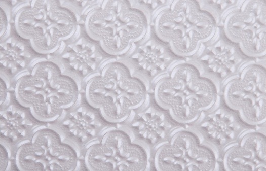 WC 20 Faux Tin Backsplash - White Pearl is made out of PVC and comes as a roll.  The image is taken of a piece of the product that is 6x4 inches.