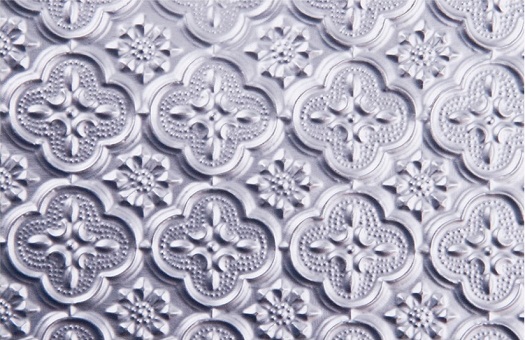 WC 20 Faux Tin Backsplash - Silver is made out of PVC and comes as a roll.  The image is taken of a piece of the product that is 6x4 inches.