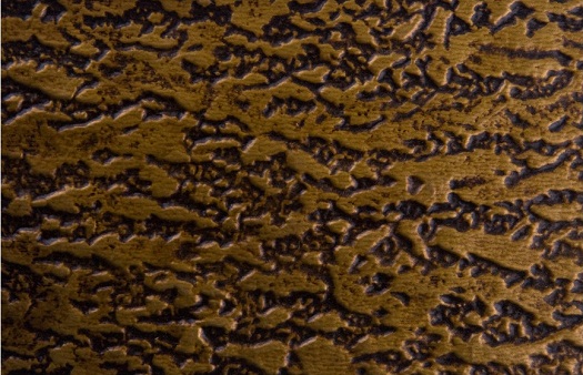 wc 30 faux tin backsplash roll in antique brass. Image taken of a 6x4 inch piece of the product.