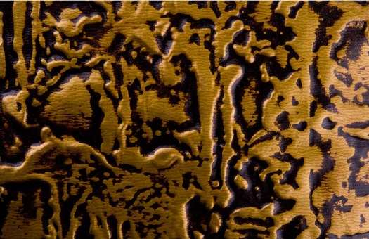 WC 40 faux tin backsplash in antique brass.  Image is taken of a 6x4 inch piece of the product.