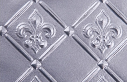 WC 80 Faux Tin Backsplash - Fleur de Lis - Silver is made from PVC and it comes in a roll as wallpaper would.  The image is take on an 6x4 piece.