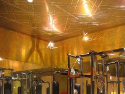 2404 Tin Ceiling Tile - Classic Floating Geometry Installed in Home Gym